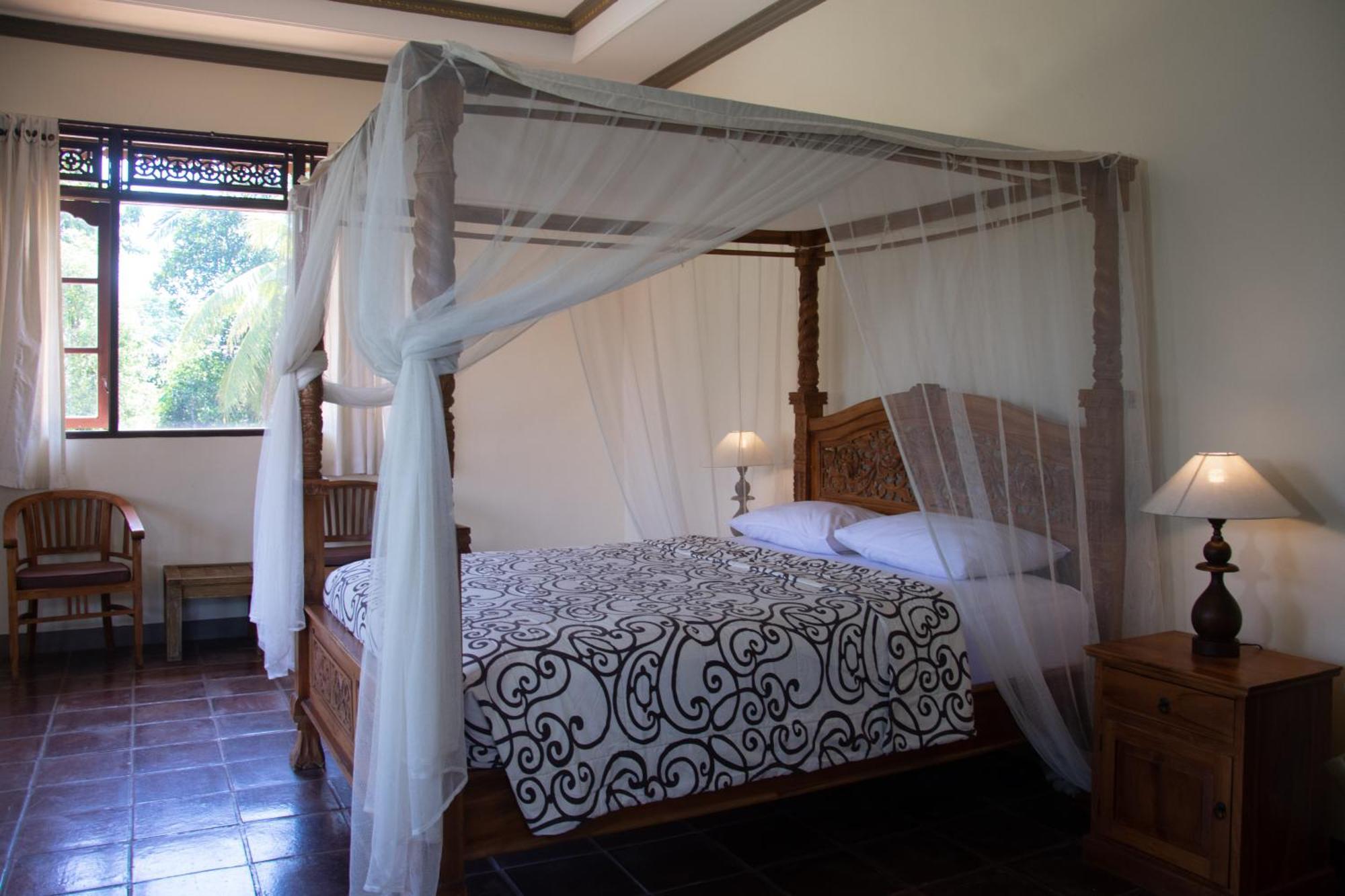 Uma Capung Mas Cottage Ubud Quarto foto