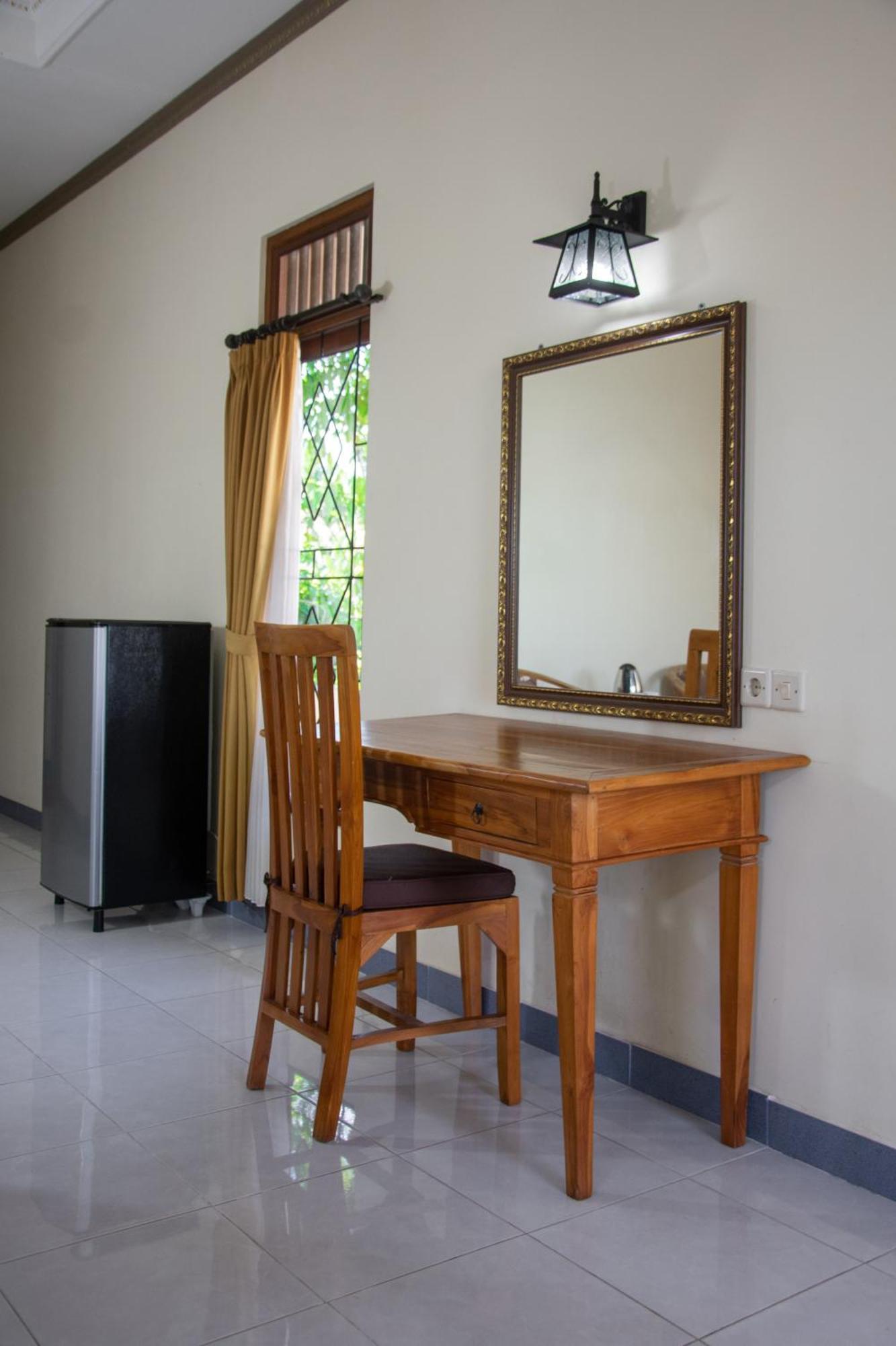 Uma Capung Mas Cottage Ubud Quarto foto