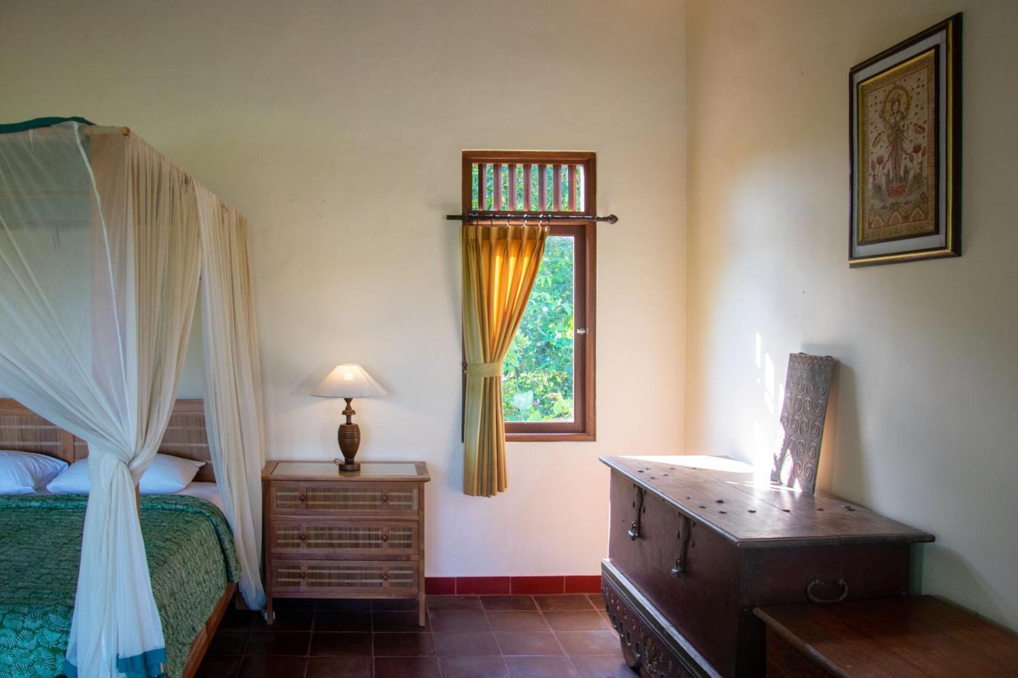 Uma Capung Mas Cottage Ubud Quarto foto