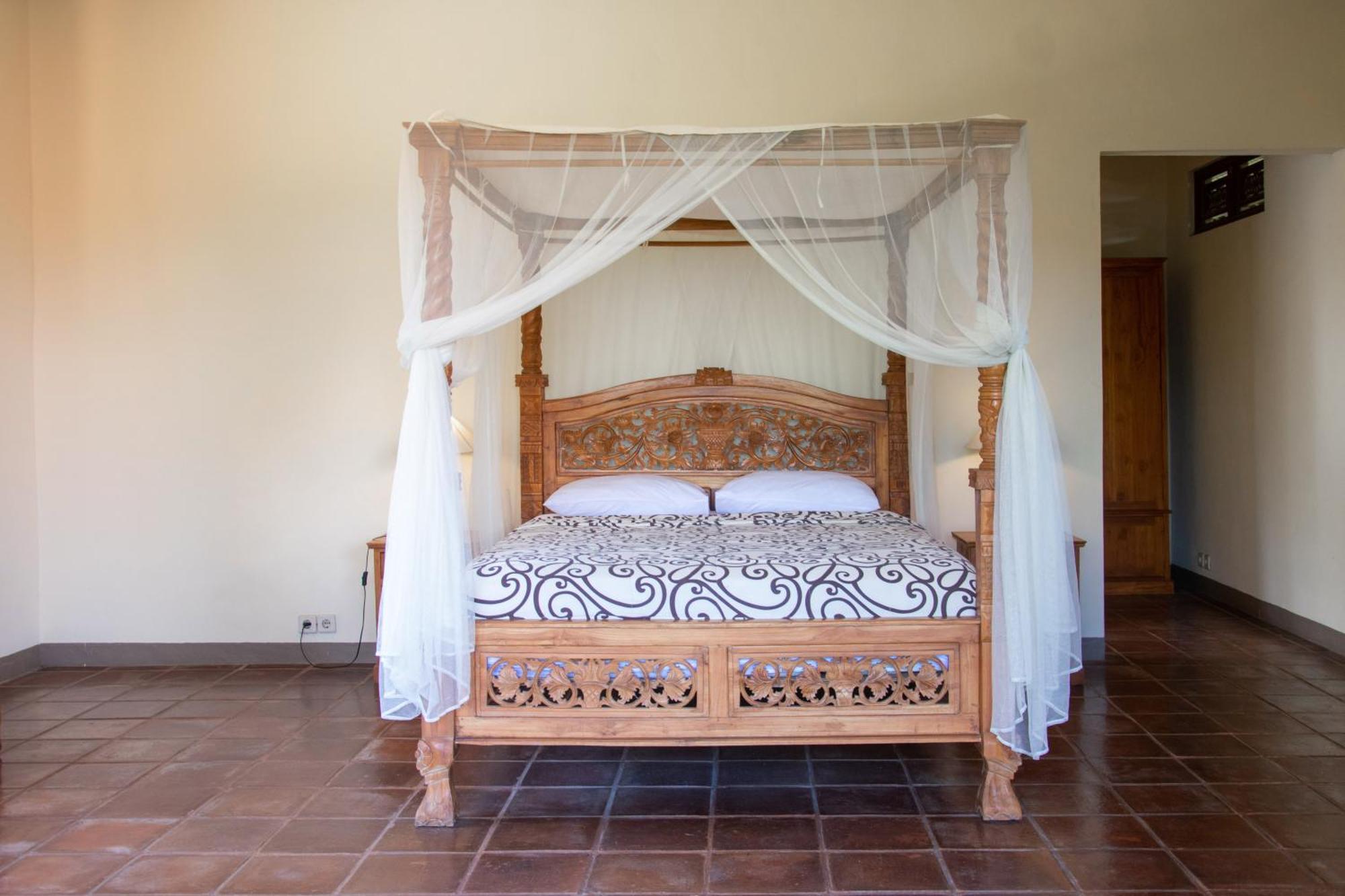 Uma Capung Mas Cottage Ubud Quarto foto
